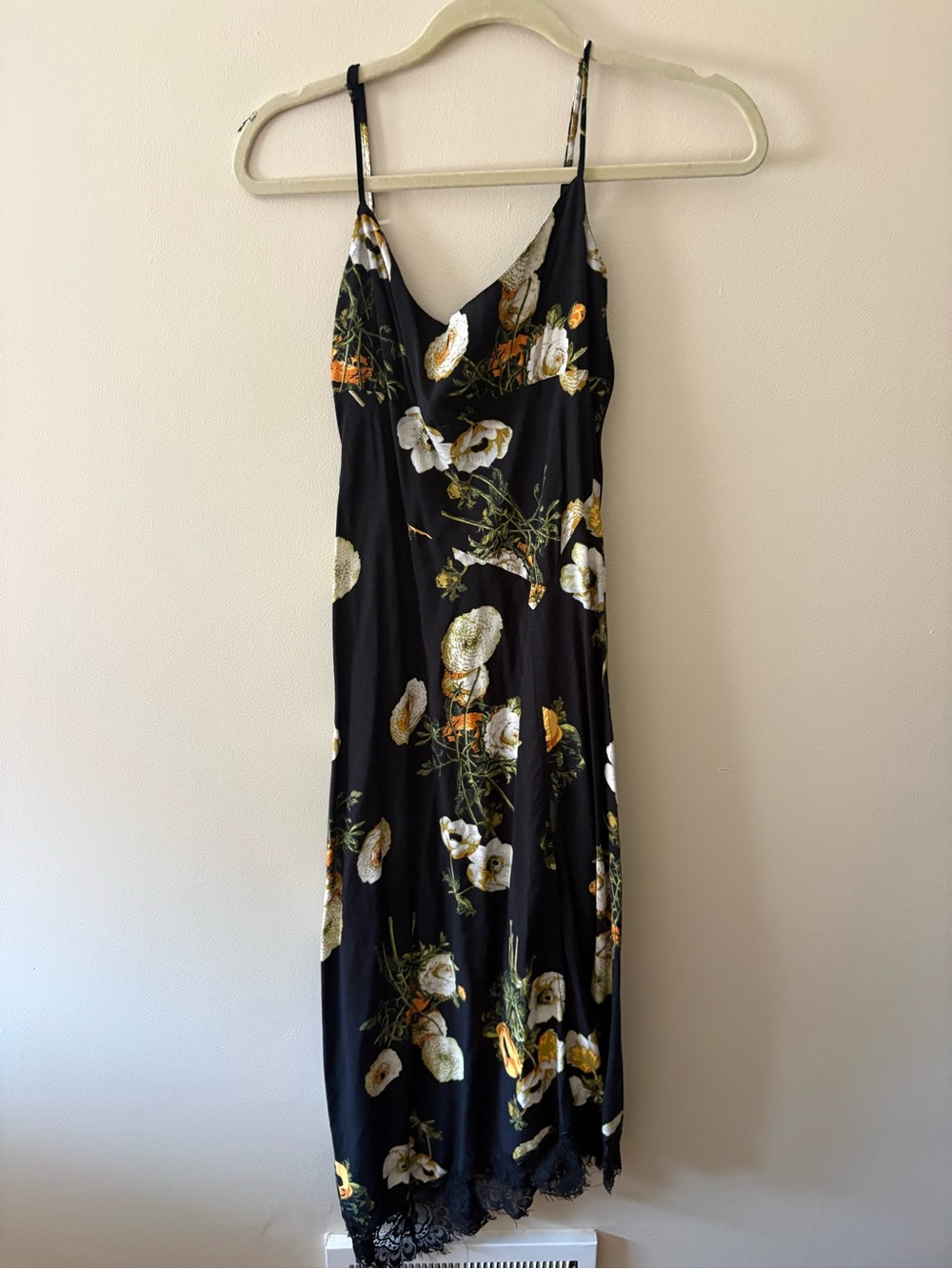 Black Floral Slip Dress with Lace Trim from Urban Outfitters
